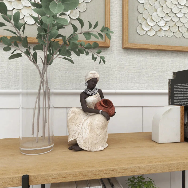 Sitting African Woman Sculpture with Red Water Pot