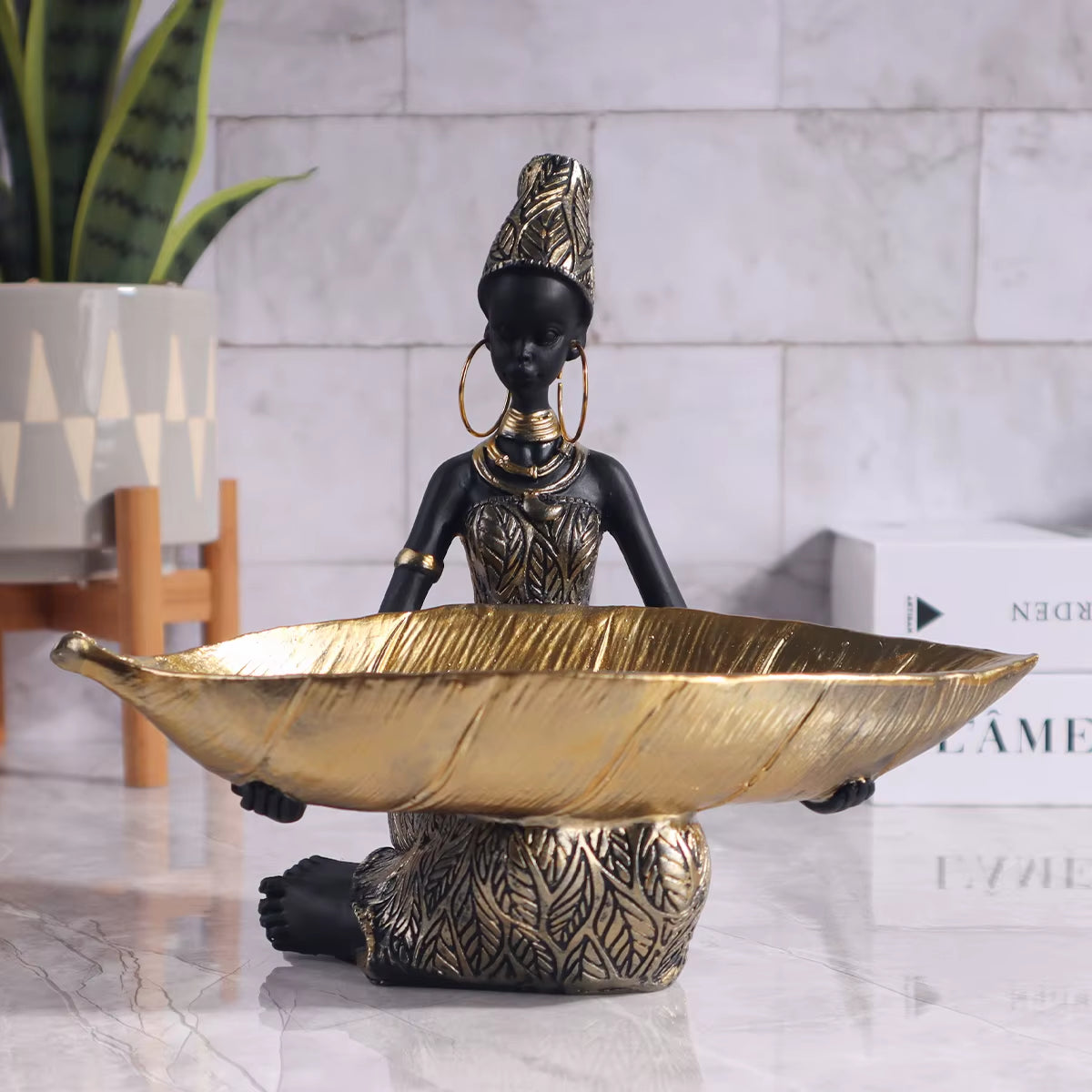 African Girl Holding a Plate Sculpture