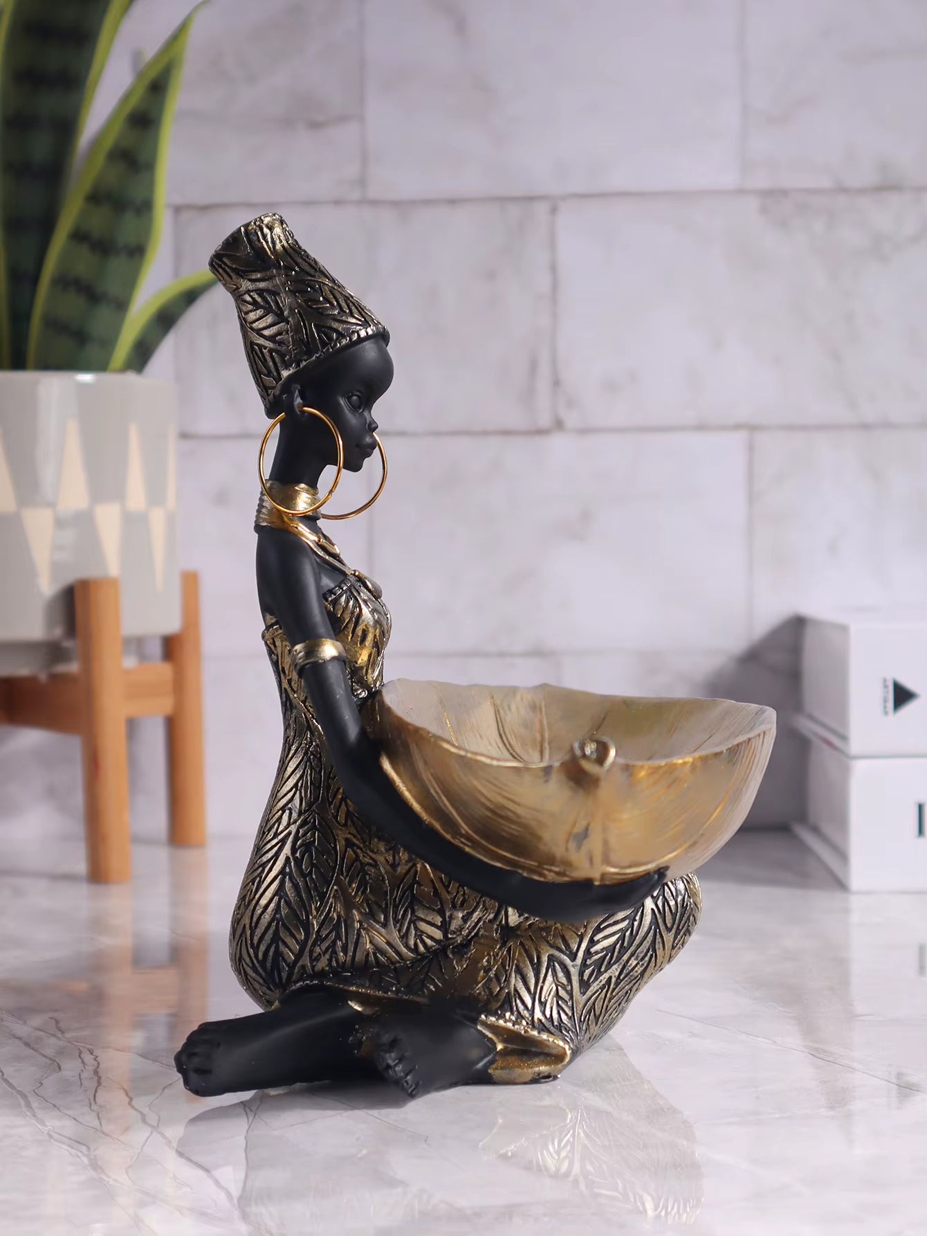 African Girl Holding a Plate Sculpture