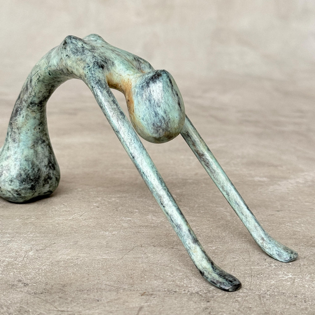 Stretching Lady Bronze Sculpture