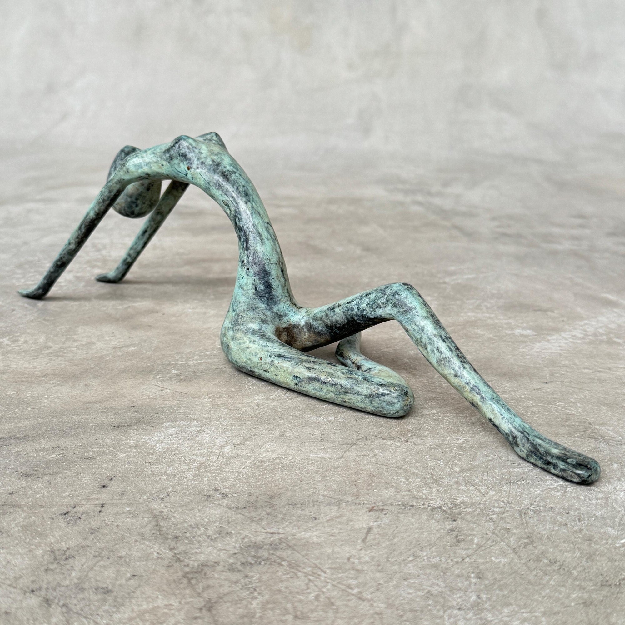 Stretching Lady Bronze Sculpture