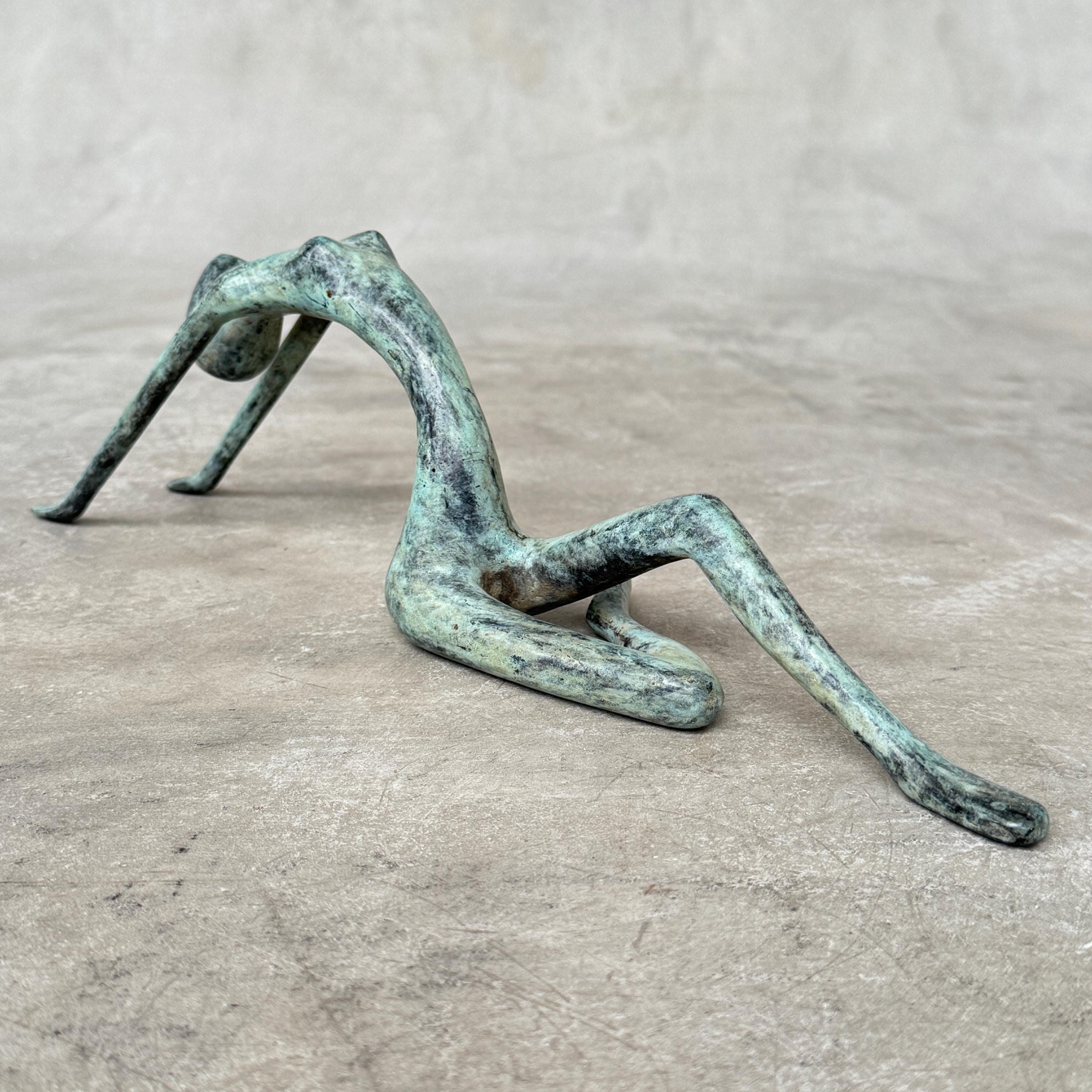 Stretching Lady Bronze Sculpture