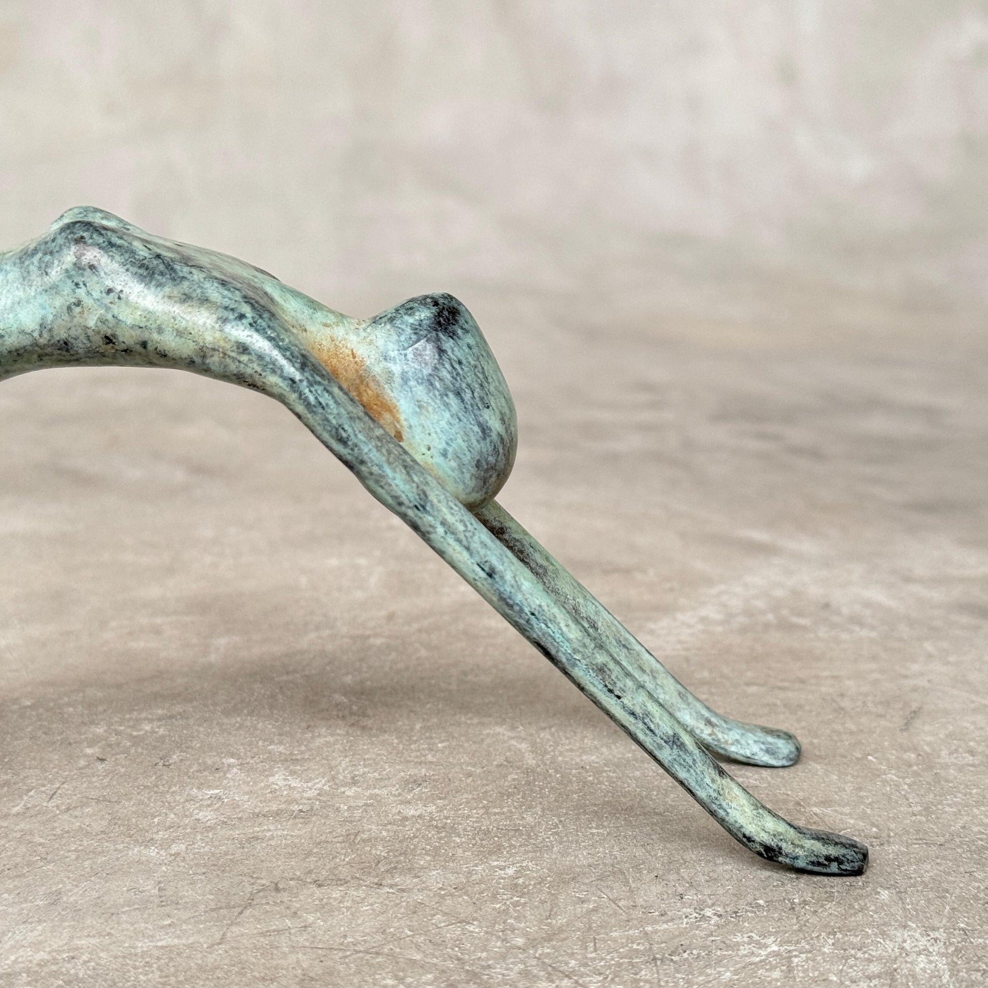 Stretching Lady Bronze Sculpture